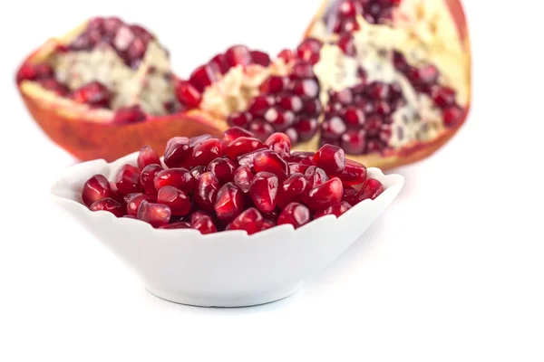 Pomegranate with seeds isolated on white background — Stock Photo, Image