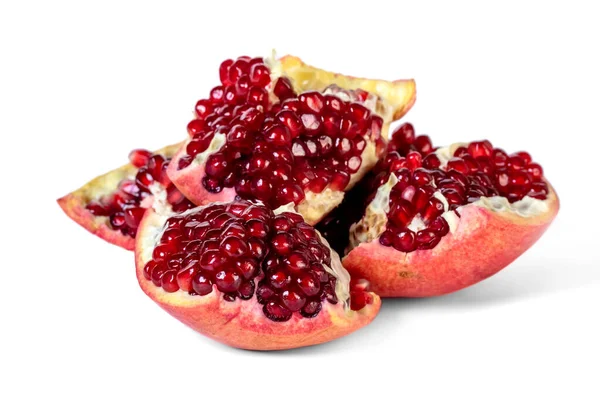 Ripe pomegranate fruit with seeds isolated on white — Stock Photo, Image