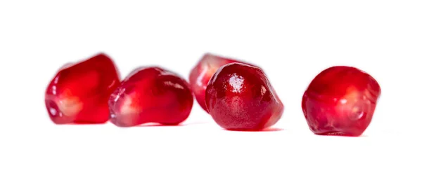 Fresh pomegranate seeds isolated on white background. Close up. — Stock Photo, Image