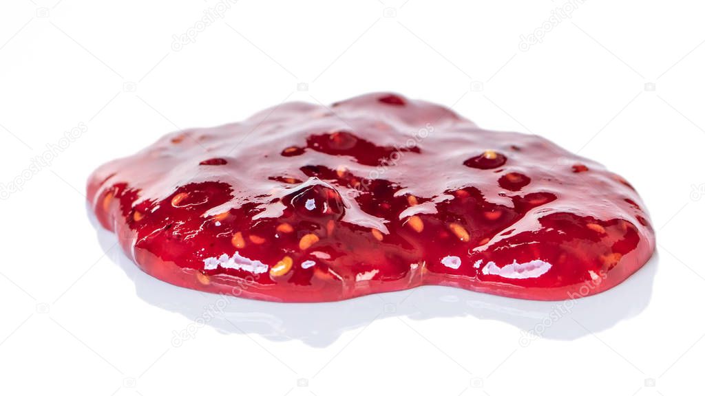 Red blackberry jam spot isolated on white background