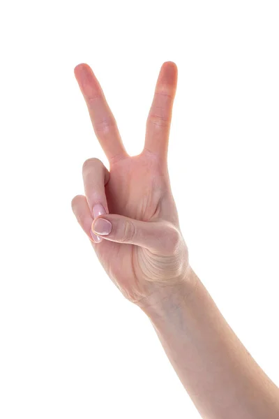 Woman hand showing victory sign isolated on white background — 스톡 사진