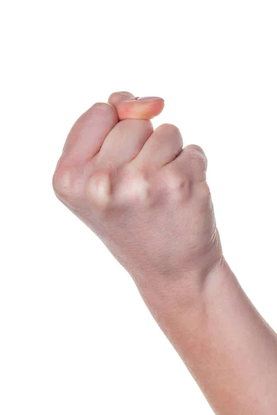 Mão feminina com os dedos dobrados em punho isolado no fundo branco . — Fotografia de Stock