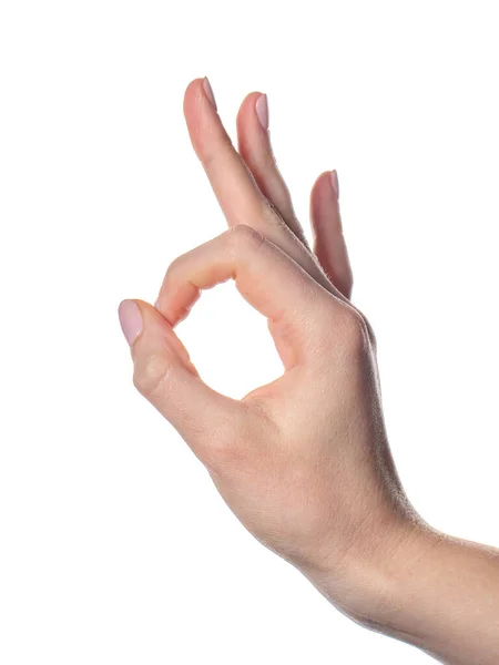 Mulher mão em ok sinal isolado em um fundo branco — Fotografia de Stock
