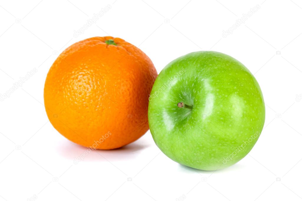 Green apple and orange isolated on white background