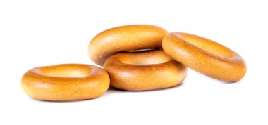 Küçük kuru simit, beyaz arka planda küçük rulo.