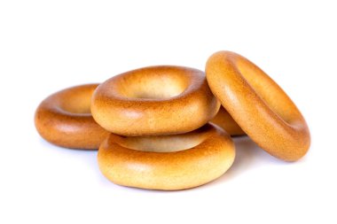 Küçük kuru simit, beyaz arka planda küçük rulo.