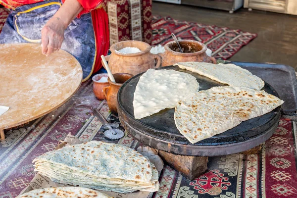 Woman making Azerbaijan Qutab with Greens. Tradition — Stock Photo, Image