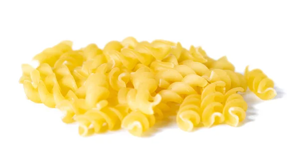 Grupp av makaroner pasta på vit bakgrund — Stockfoto