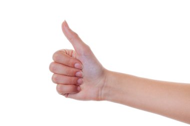 Woman hand shows thumb up gesture isolated on white