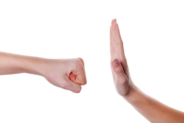 Hand fist in the attack and in defense of the open hand on white — Stock Photo, Image