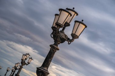 Bari seafront lights. Coastline and Twilight purple and blue sky.