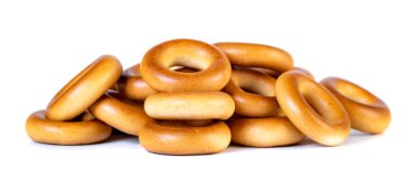 Küçük kuru simit, beyaz arka planda küçük rulo.