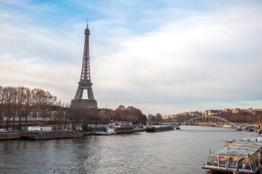 Paris, France - January 18, 2019: View to Eiffel Tower and Siena from the bridge.
