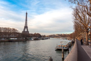 Paris, France - January 18, 2019: View to Eiffel Tower and Siena from the bridge.