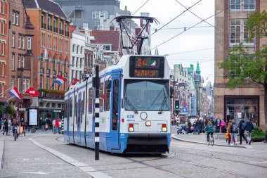 Amsterdam, Netherlands - October 14, 2019: Tram driving in Amsterdam city center. Travel