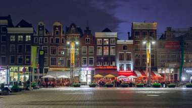 Amsterdam, Netherlands - October 14, 2019: Famous landscape in Amsterdam with unique building at night