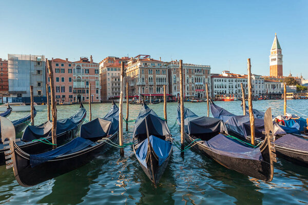 Venice, Italy - August 16, 2018: View of Doge palace and San Marko square from Grand canal in Venice
