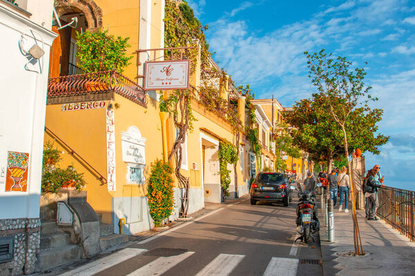 Positano, Italy - 1 November, 2019: Typical narrow street and colorful houses in city of Positano, Amalfi coast