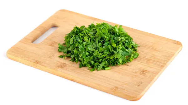 Gehackte Petersilienblatt Auf Einem Holzbrett Isoliert Auf Weißem Hintergrund Gemüse — Stockfoto