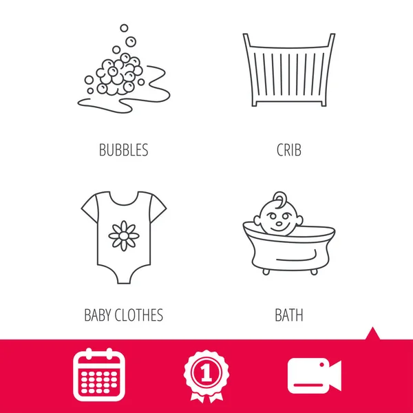 Babykläder, bad och babysäng ikoner. — Stock vektor