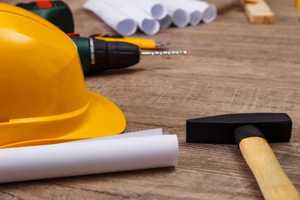 Hammer, helmet and drill. Construction. — Stock Photo, Image