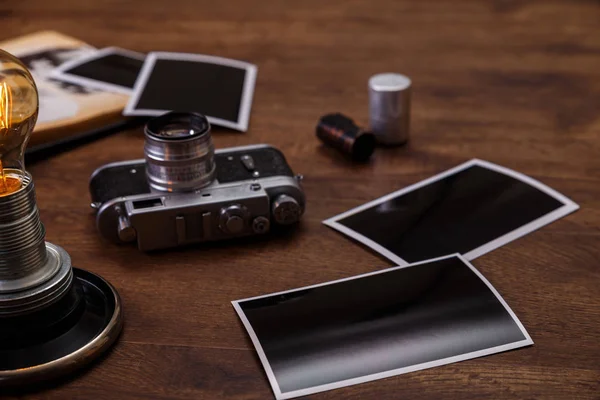 Vintage photo camera. Blank photo frames.