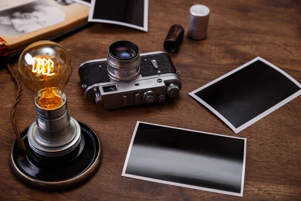 Vintage photo camera. Blank photo frames.