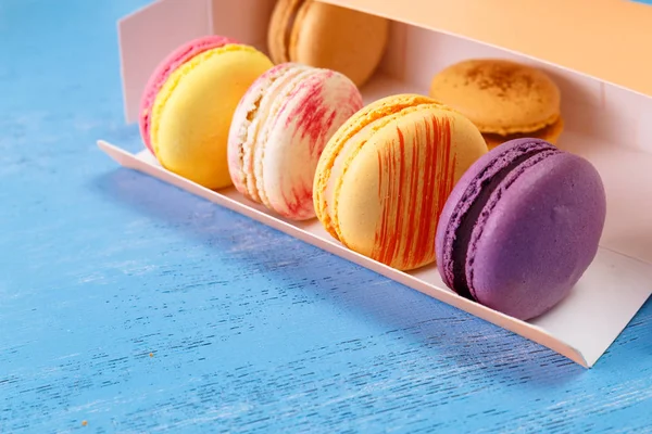 Macaroon cakes. Dessert in delivery box.