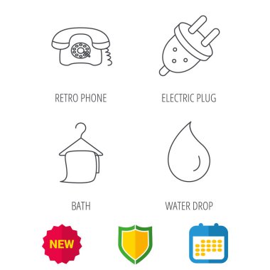 Retro telefon, banyo havlusu ve elektrik fişi.