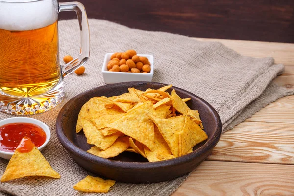Glass of beer. Nachos chips. Tortilla snack. — Stock Photo, Image