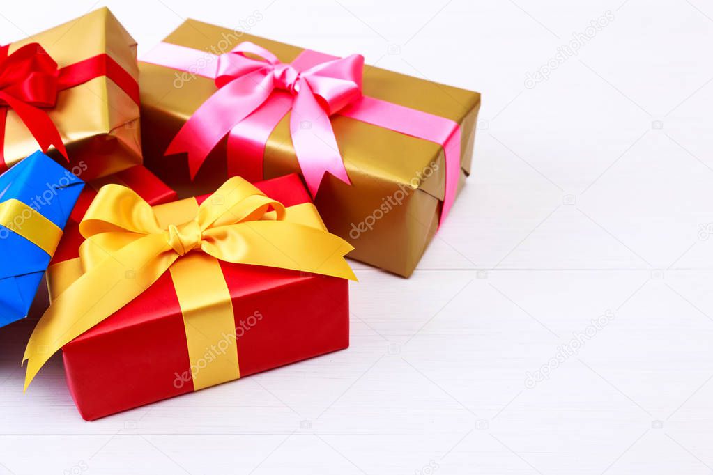 Gift boxes with bow and ribbon. Present packages.