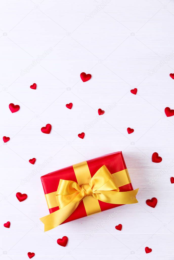 Gift box with red hearts. Present package.