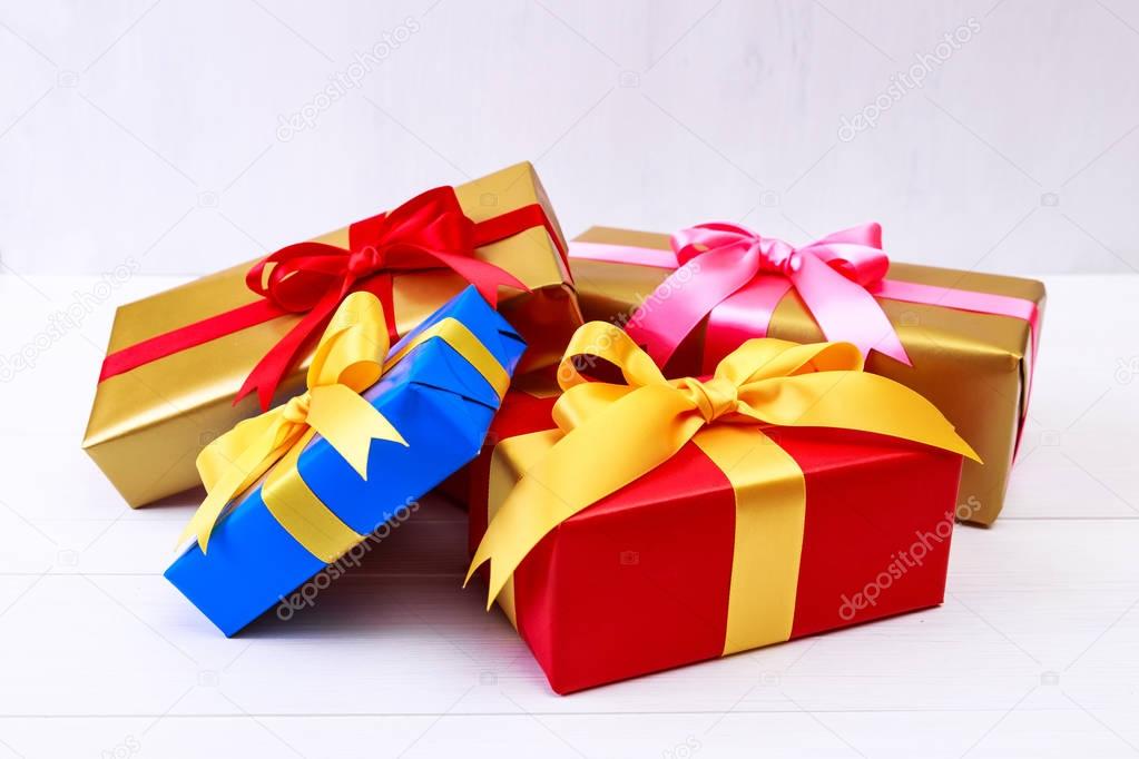 Gift boxes with bow and ribbon. Present packages.