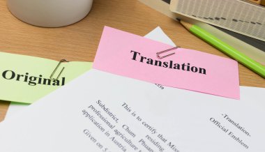 translation paper on wooden table clipart