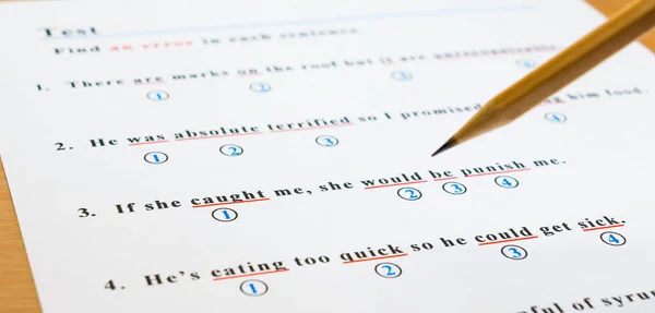 English test and answer sheet on table — Stock Photo, Image