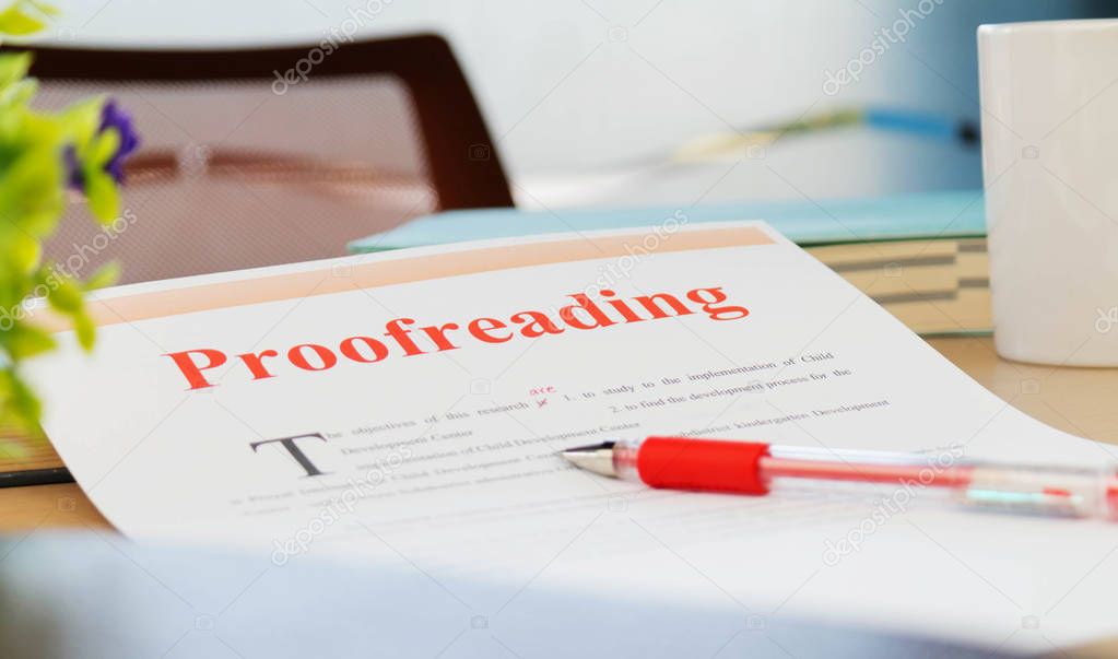 proofreading paper on table