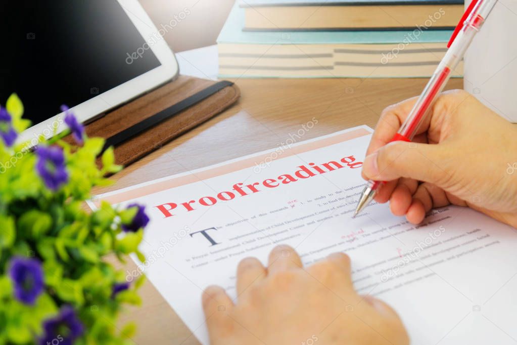 proofreading paper on table