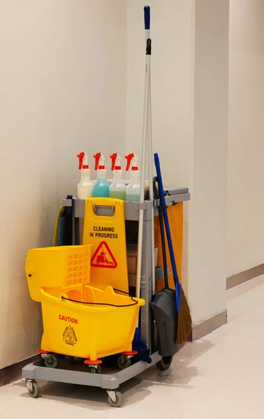 cleaning equipment on cart