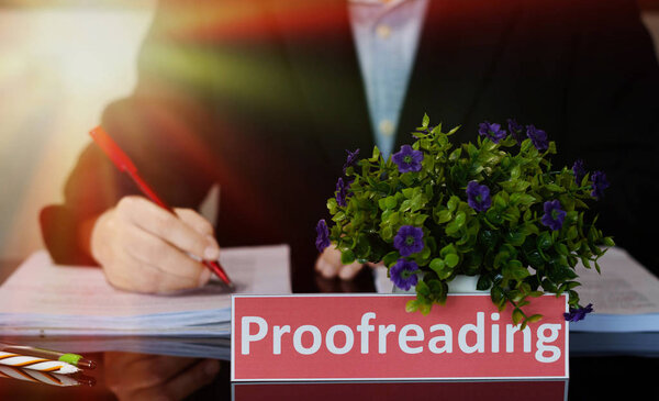 proofreading English card on black table