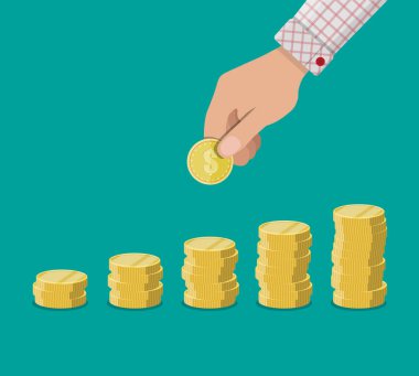 altın madeni para tutan ele