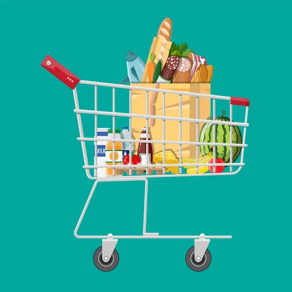 Shopping cart full of groceries products - Stok Vektor