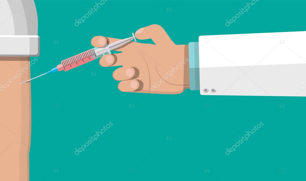 Doctor hand with syringe, vaccination of patient.
