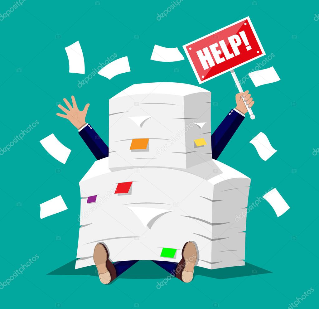 Businessman in pile of office papers