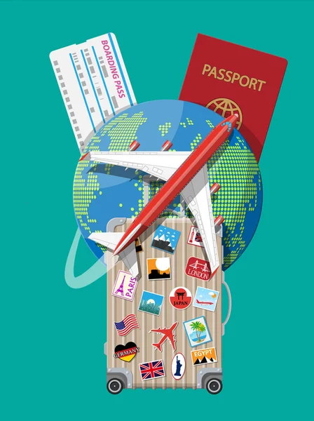 Reisekoffer mit Aufklebern und Weltkarte — Stockvektor