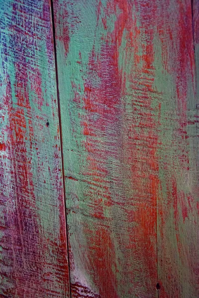 Rough red- cyan panted wood texture