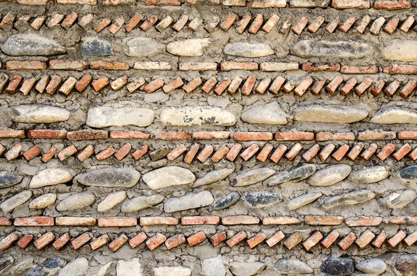 Antigua pared de ladrillos y piedra . — Foto de Stock