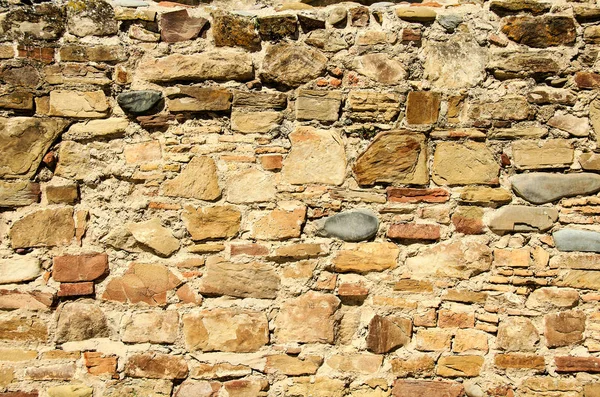 La textura de las piedras viejas junto con el cemento . — Foto de Stock