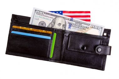 Yüz dolarlık banknot siyah eski çanta dışarı ulaşmak.