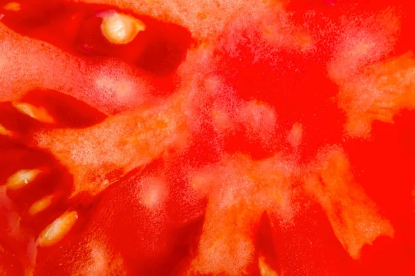 Fondo alimenticio. Rebanada de tomate rojo fresco. Macros detallados . —  Fotos de Stock