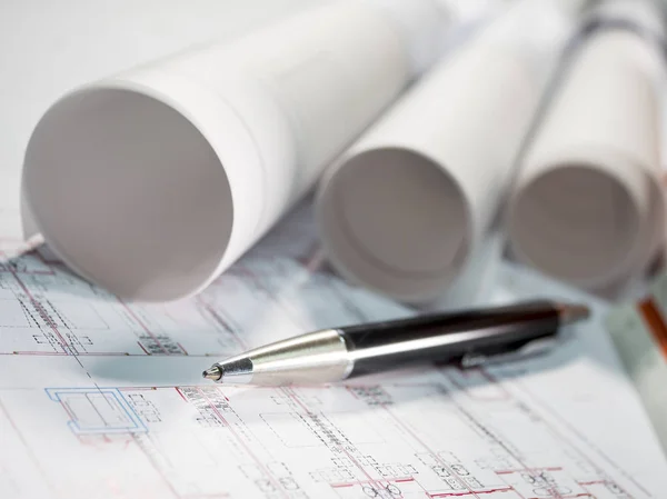 Architect rolls and plans, technical project drawing and pen 1 Royalty Free Stock Photos